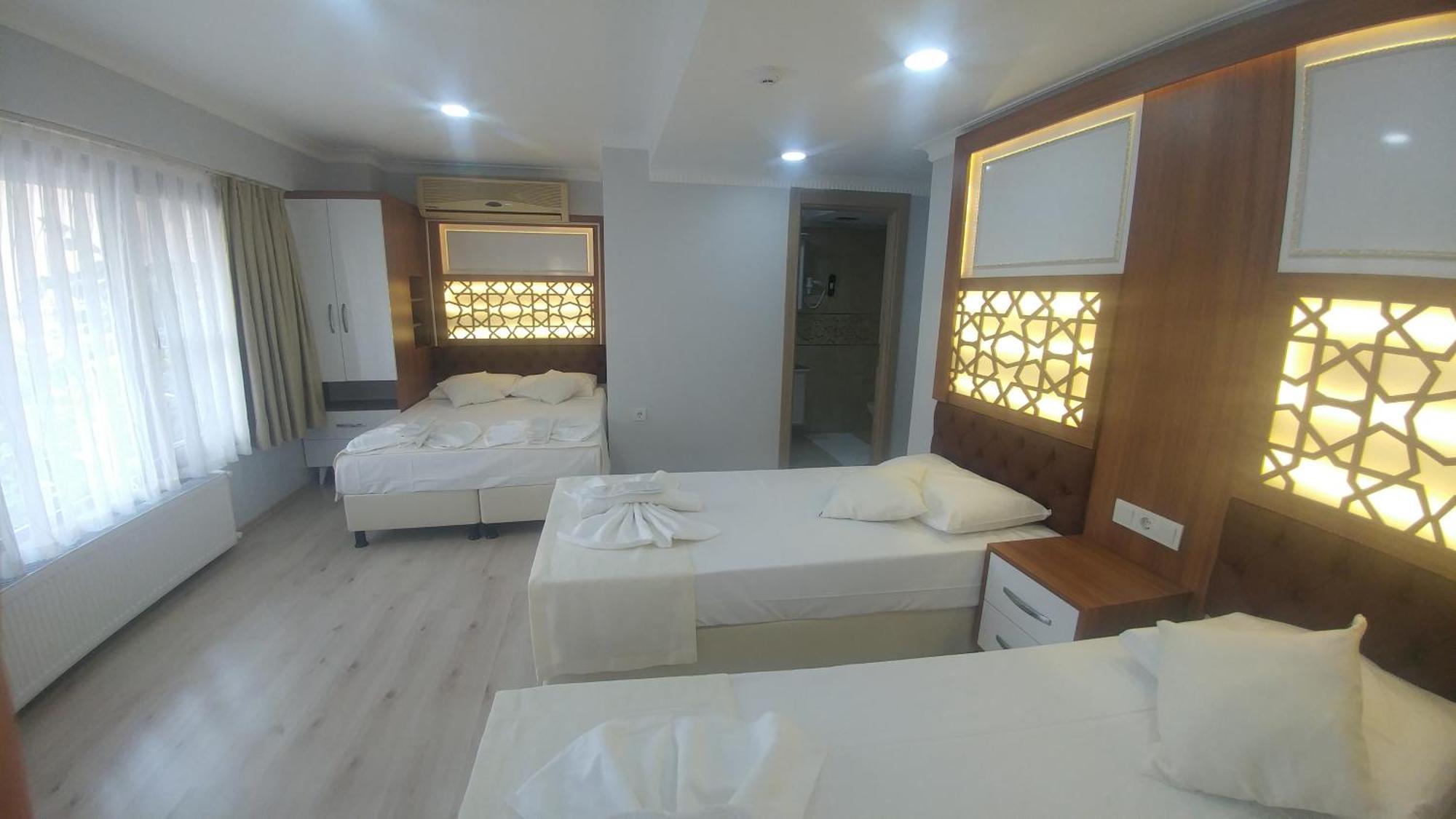 Deluxe Quadruple Room,1019944096:JPEG