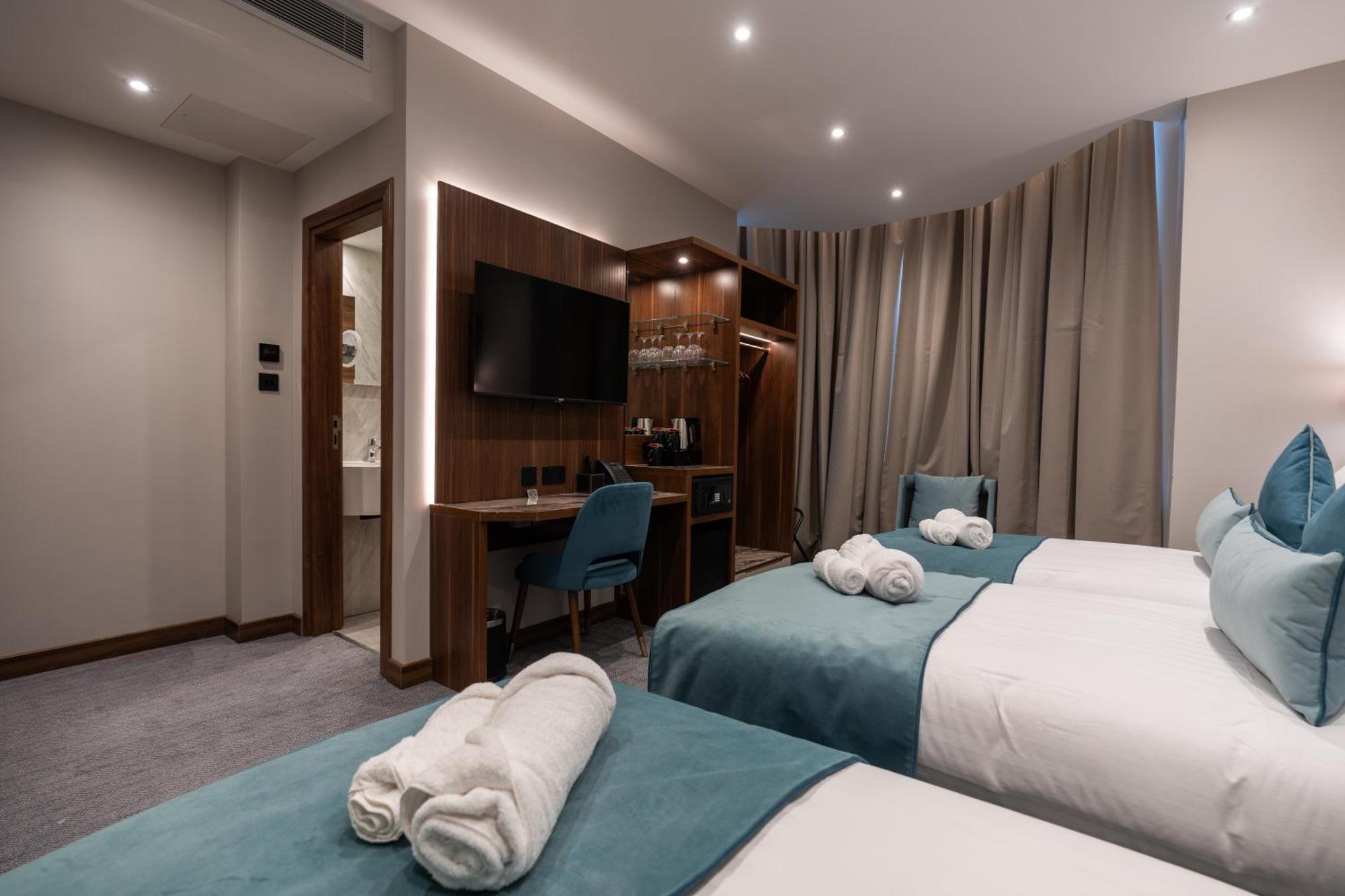 Deluxe Triple Room,1628647174:JPEG