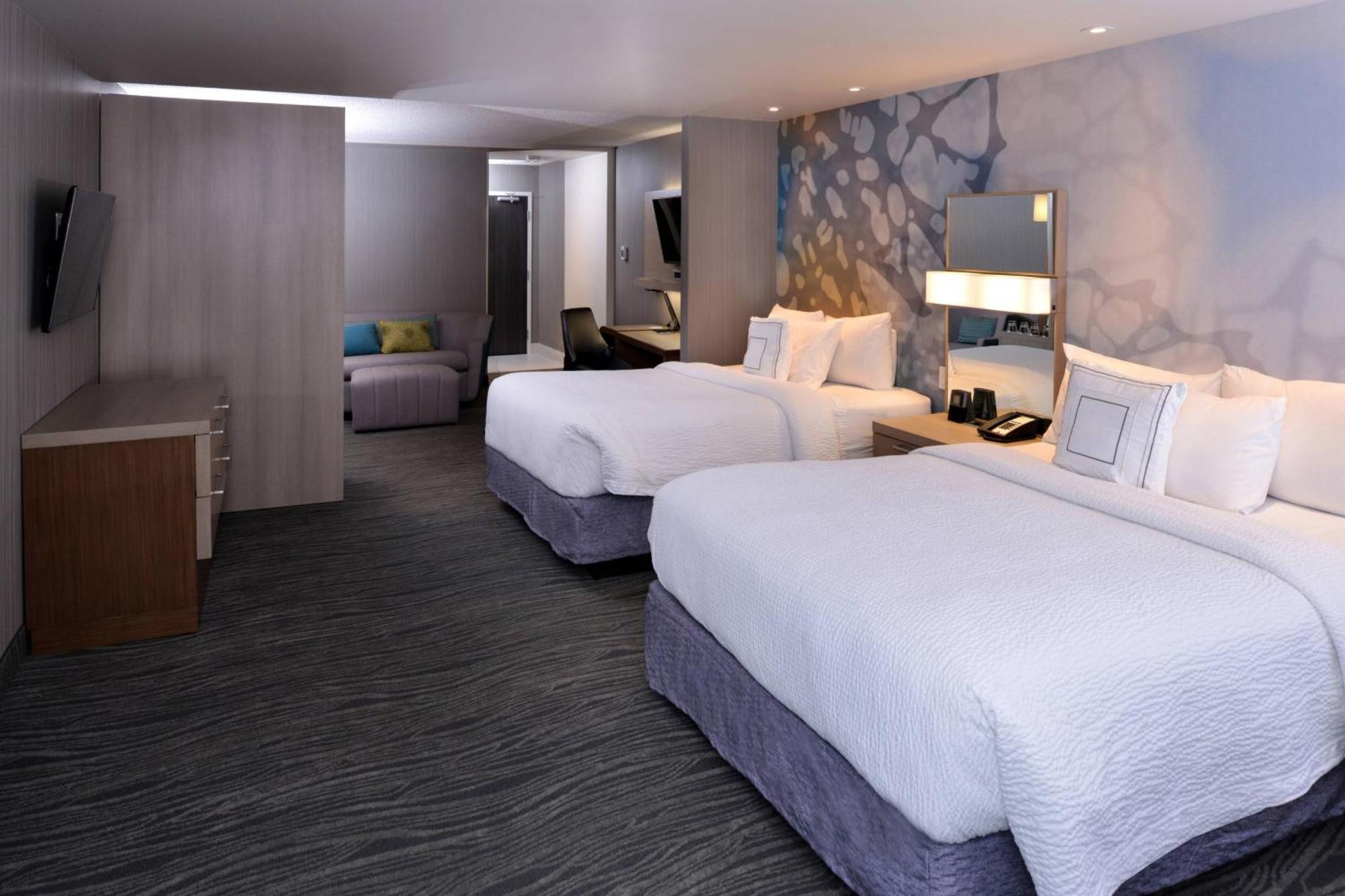 Queen Suite with Two Queen Beds and Sofa Bed