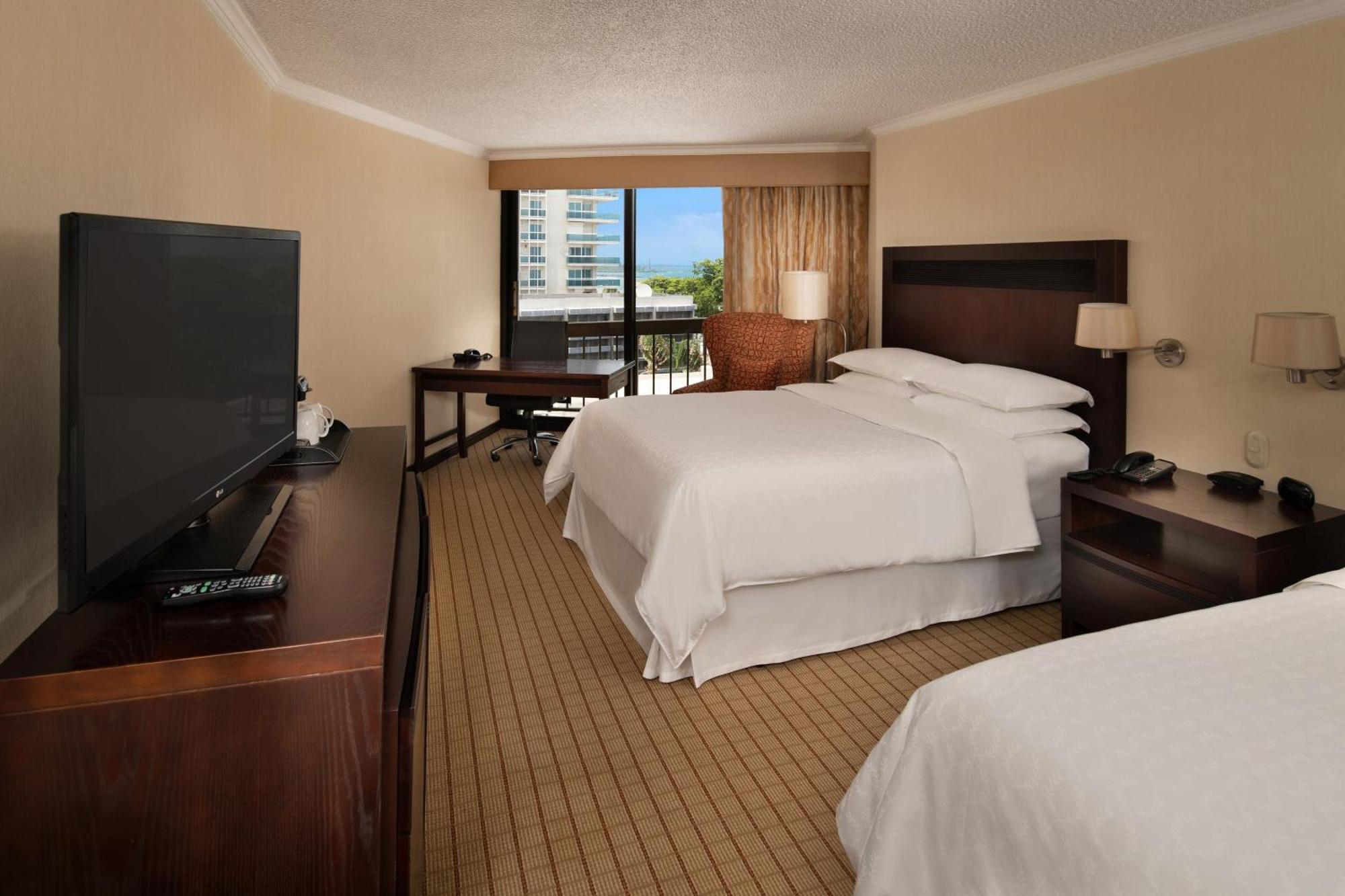 Larger Guest room 2 Queen Partial ocean view