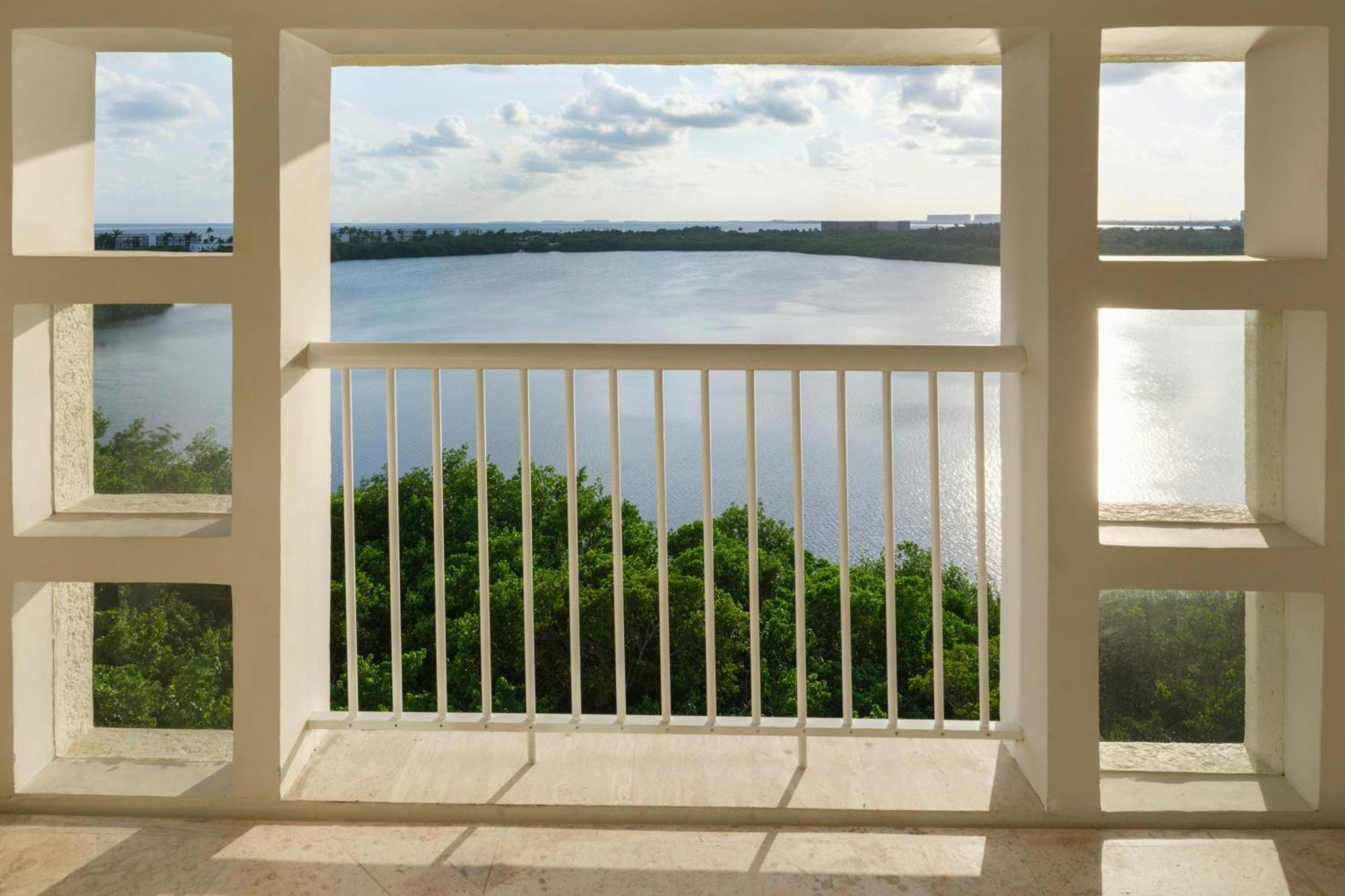 Habitación Doble Deluxe con balcón y vistas a la laguna - 2 camas dobles