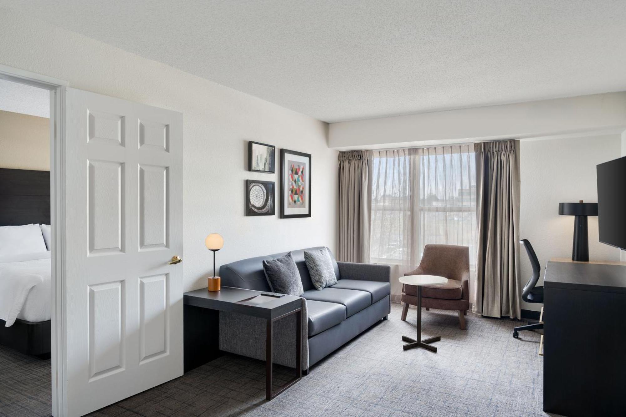 One-Bedroom Queen Suite Sofa Bed Adapted Tub Mobility Hearing Accessible,1766134473:JPEG