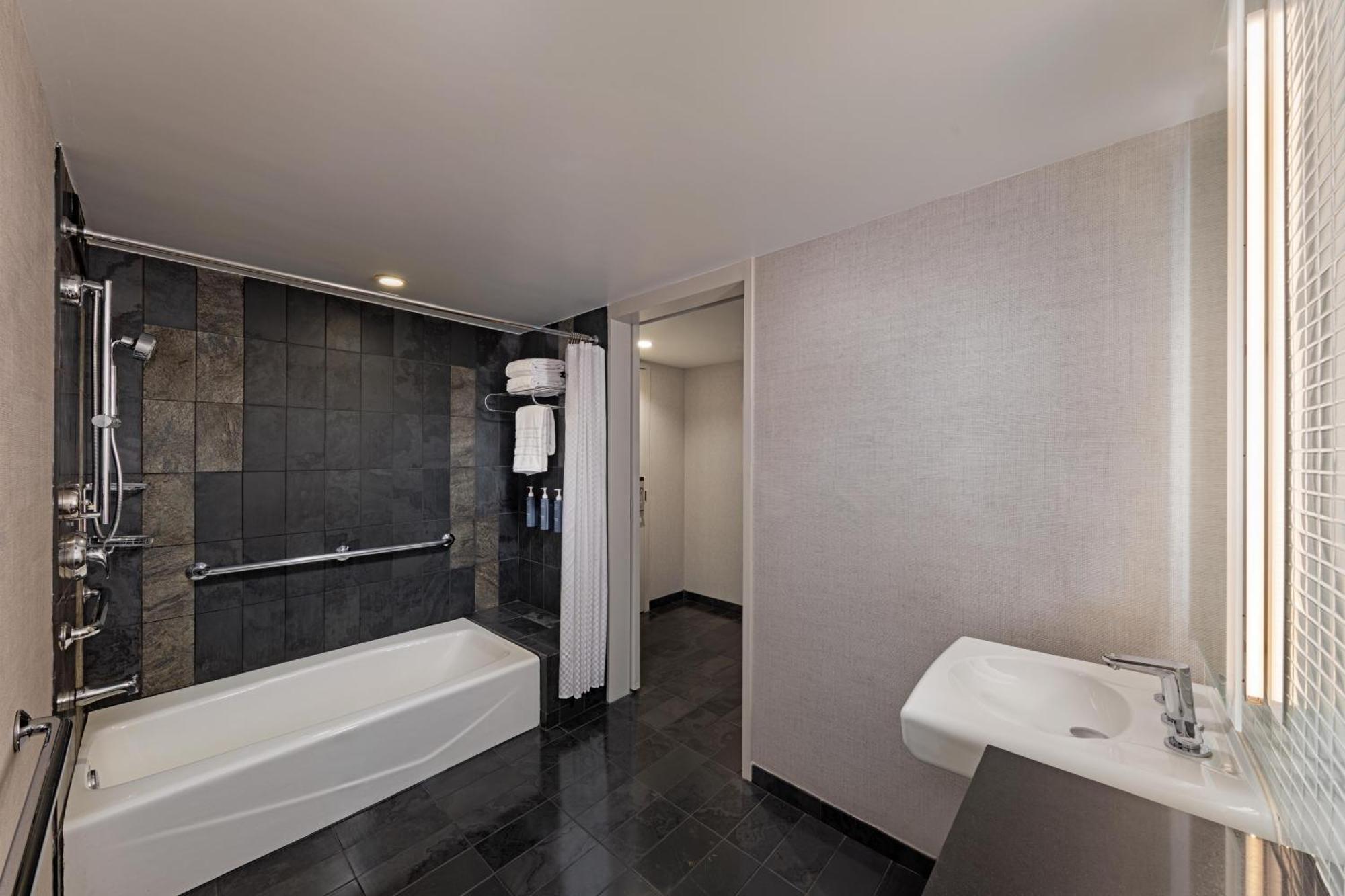 Grand Deluxe Queen Room Two Queen Beds Roll Shower Mobility Hearing Accessible