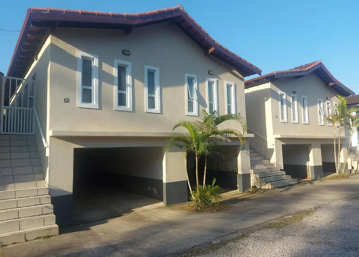 Casas Em Condominio Proximo Da Praia Com 2 Dormitorios, Churrasqueira E 3 Vagas De Garagem