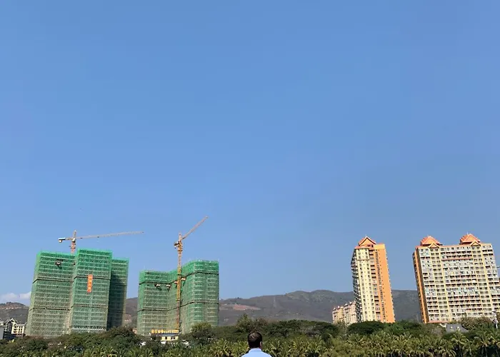 Xishuangbanna International Aerial Garden South Of Mekong River Business Hotel 傣江南商务酒店