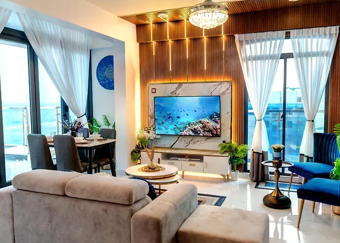 Aina Residency Beachfront Hotel