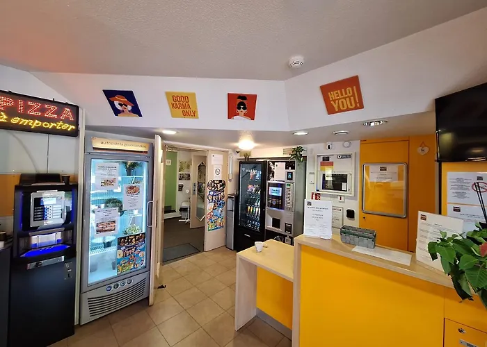 ENZO HOTELS GREEN proximité ZENITH D' AUVERGNE Ex F1 FORMULE 1 CLERMONT FERRAND ISSOIRE COUDES