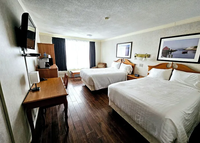 Claymore Inn And Suites