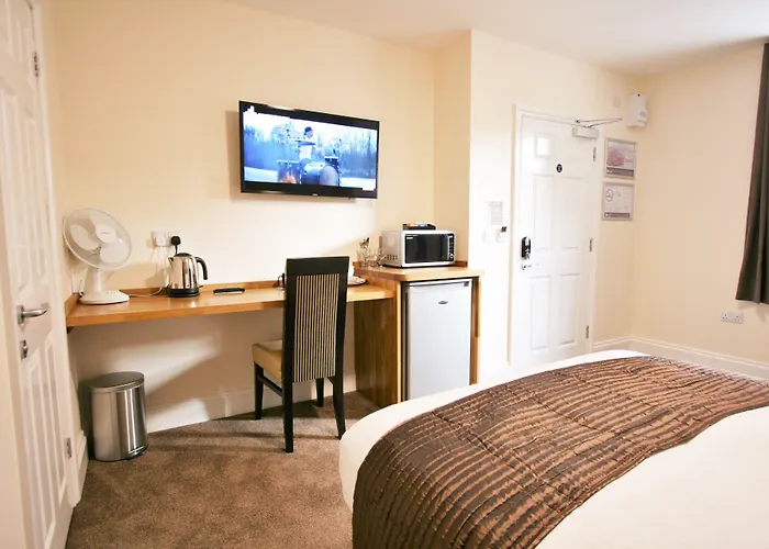 New County Hotel & Serviced Apartments By Roomsbooked